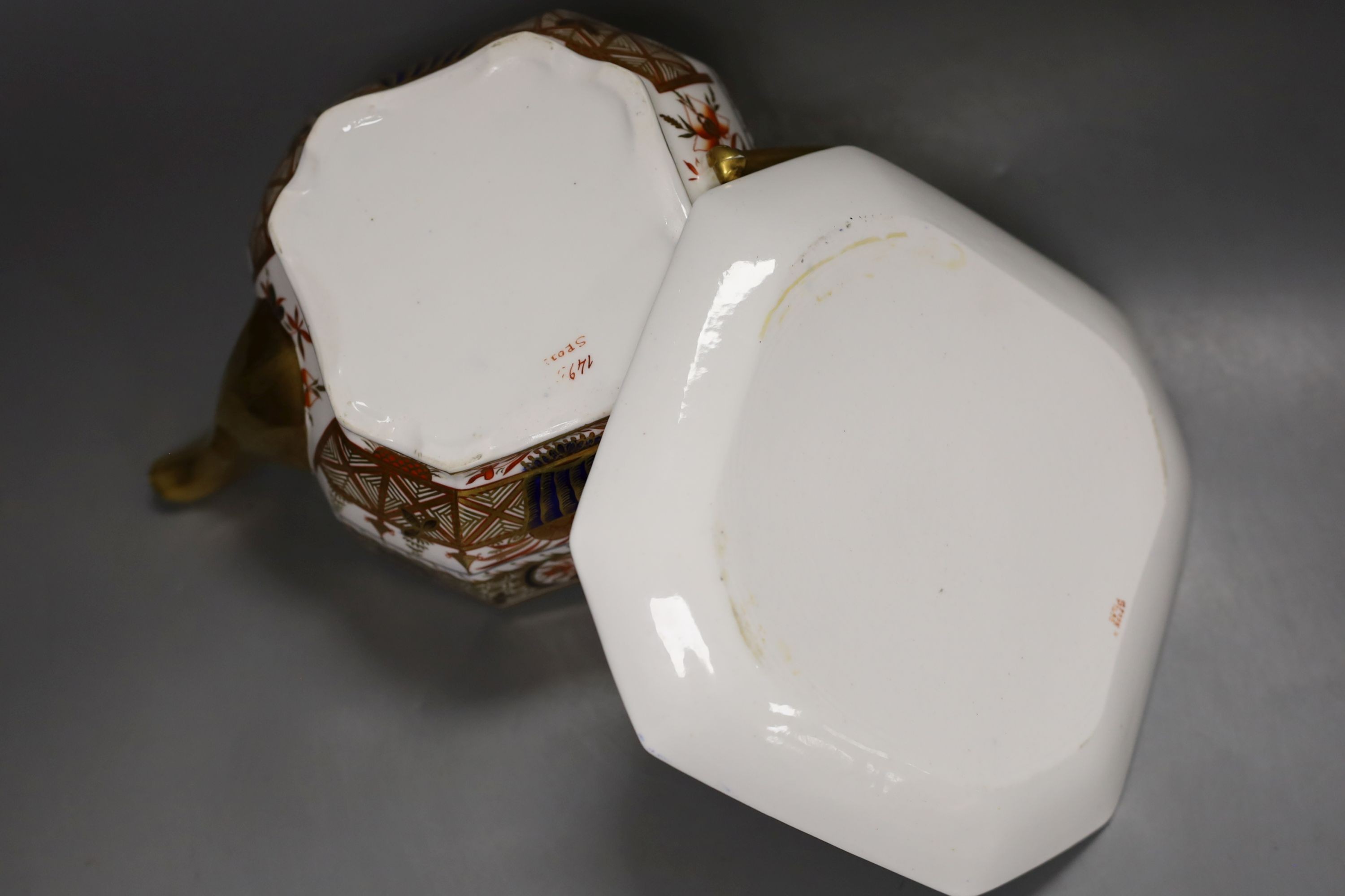 A Spode teapot cover and stand painted with Imari pattern, 1495, c.1820, 24.5 cm long